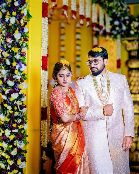 alt="Telugu wedding couple posing together in traditional ceremony in Hyderabad"