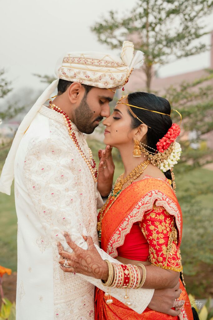 Engagement, Wedding, and Reception Photography showcasing a stunning bride in traditional attire with elegant South Indian wedding details